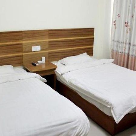 Yiwu Dong Ou Hotel Exterior foto